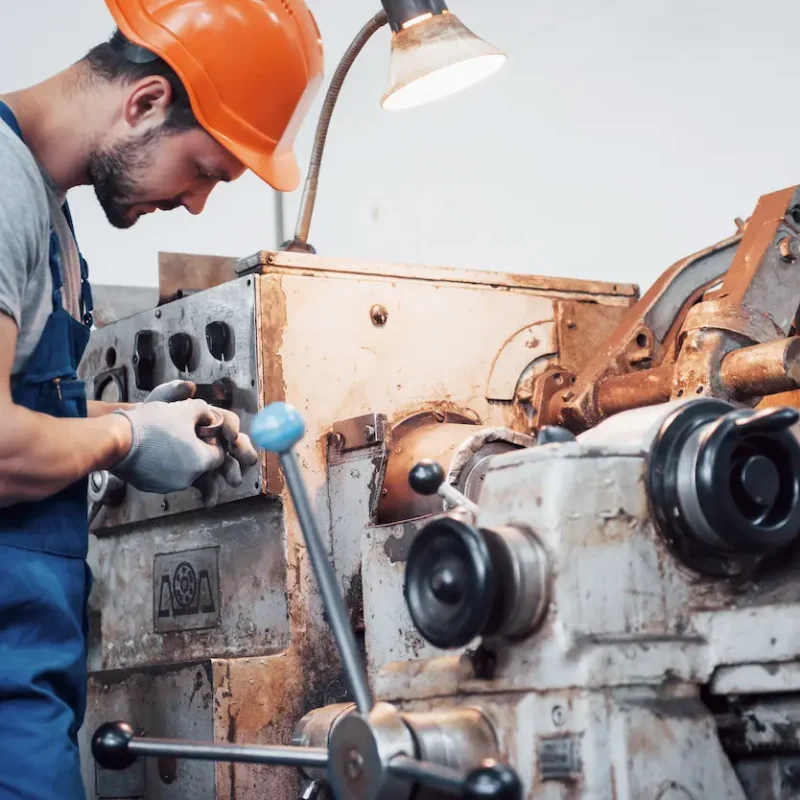 portrait-young-worker-hard-hat-large-metalworking-plant